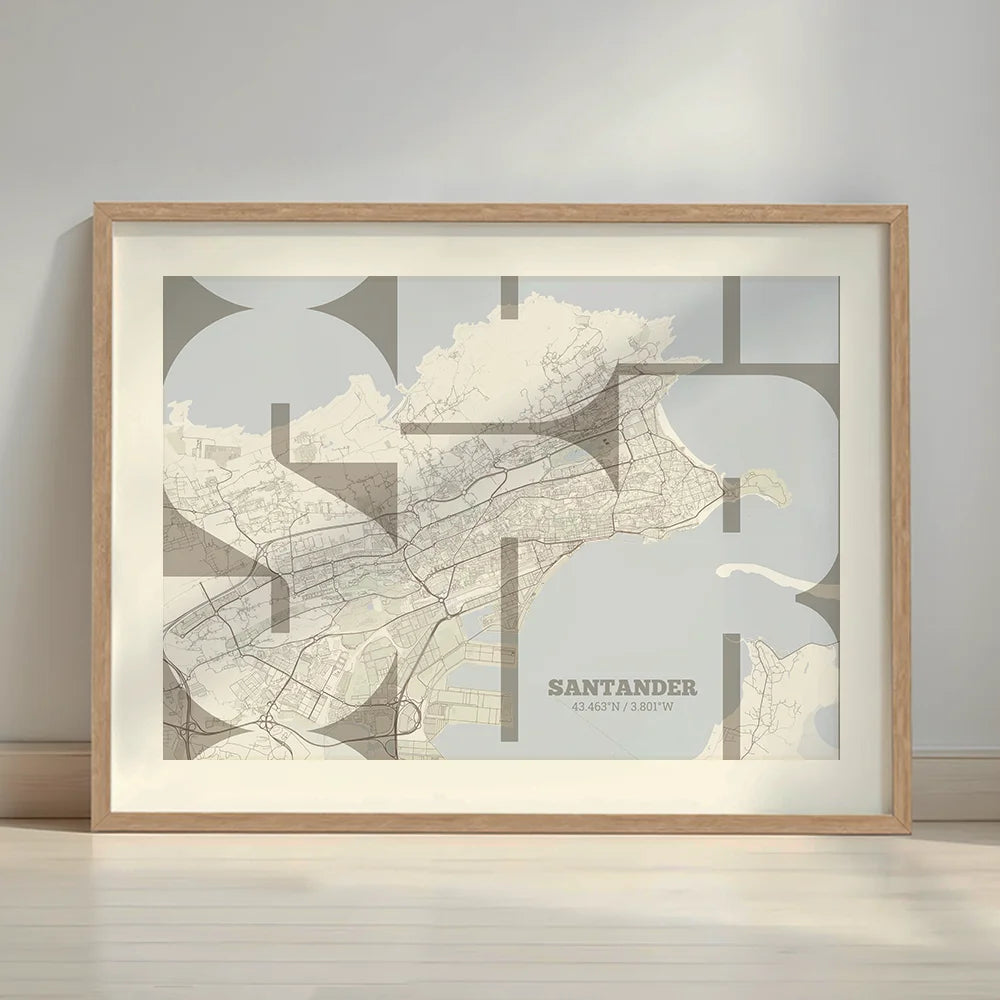 Framed Santander in Inseparable design, featuring the city's abbreviation in expressive typography over a detailed urban map designed in light brown and an off-white background with a white margin border in a warm lit minimalist setting
