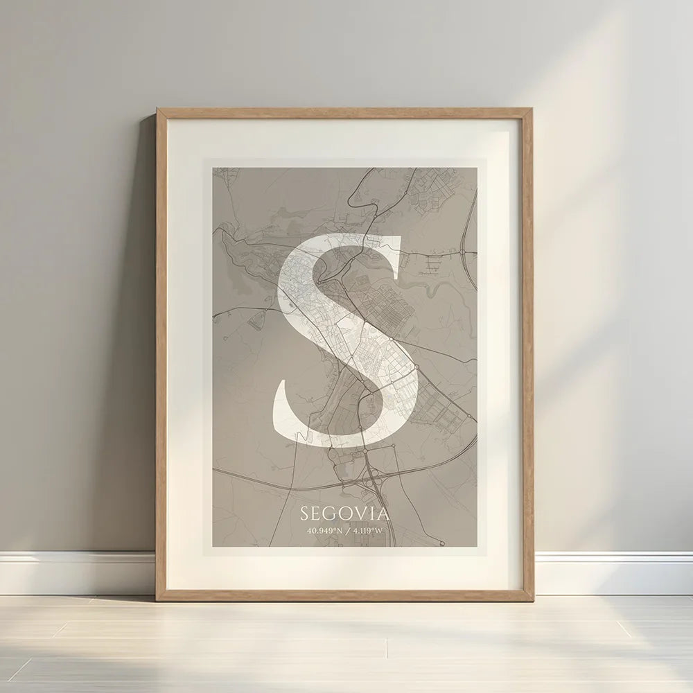 Framed Segovia in Classic design, inspired by chiseled typography with an elegant font that creates a beautiful visual contrast designed in light brown and an off-white background with a white margin border in a warm lit minimalist setting