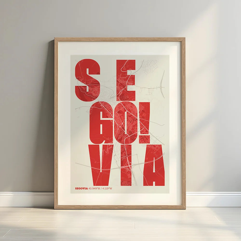 Framed Segovia in Unruled design, where the city name letters appear randomly across different lines for a truly original urban layout designed in red and an off-white background with a white margin border in a warm lit minimalist setting