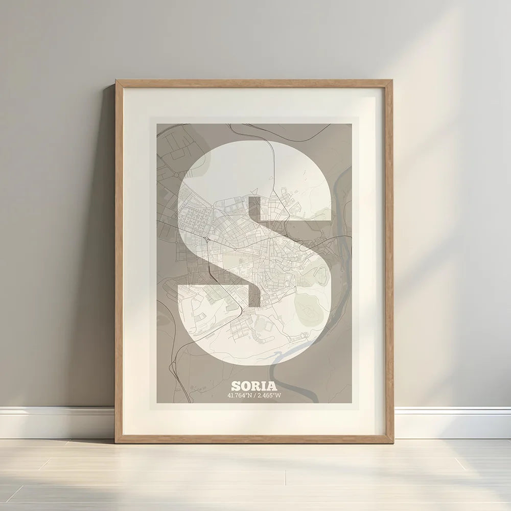 Framed Soria in Super Bold design, a typographic poster where the city map is overlaid with extra-thick lettering for a modern, high-impact look designed in light brown and an off-white background with a white margin border in a warm lit minimalist setting