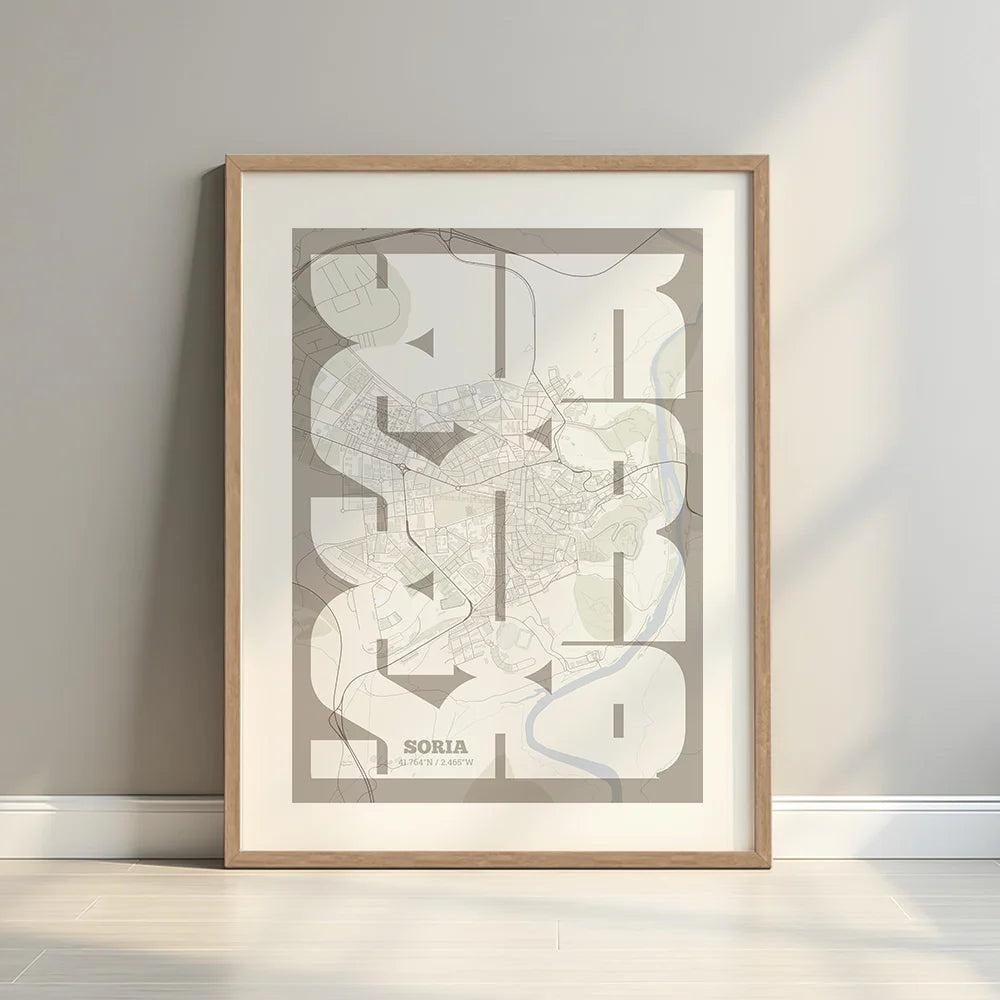Framed Soria in Inseparable design, featuring the city's abbreviation in expressive typography over a detailed urban map designed in light brown and an off-white background with a white margin border in a warm lit minimalist setting
