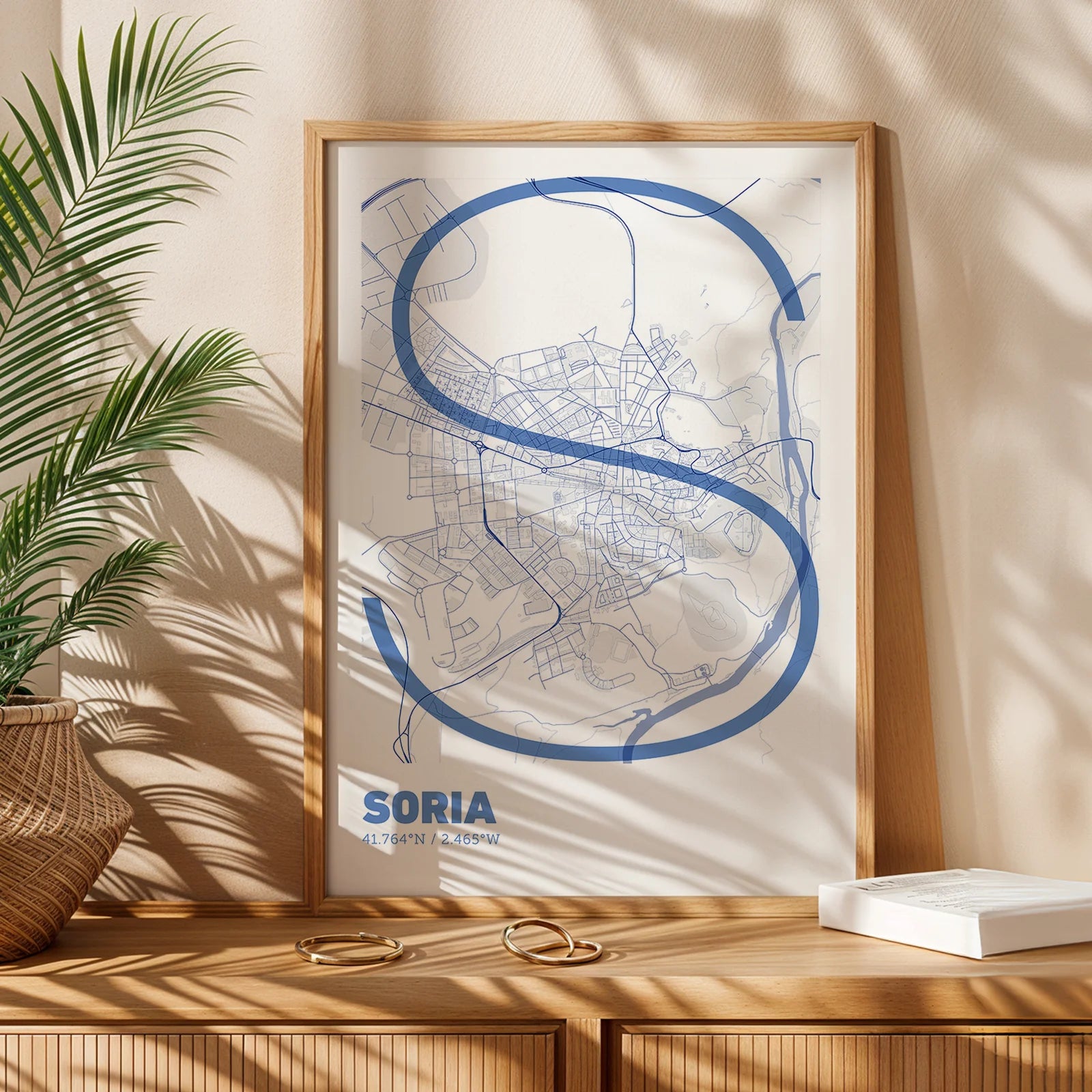 Modern interior design with a Soria in Ultralight design, a minimalist aesthetic combining urban cartography with modern, extra-thin elegant lettering designed in navy blue and white, displayed on a living room wall