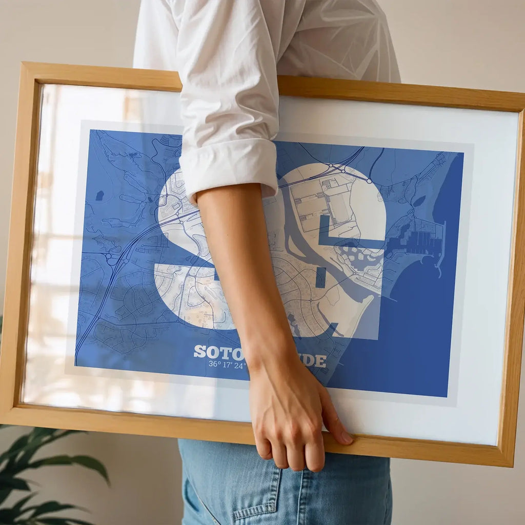 Modern interior design with a Sotogrande in Super Bold design, a typographic poster where the city map is overlaid with extra-thick lettering for a modern, high-impact look designed in navy blue and white, displayed on a living room wall