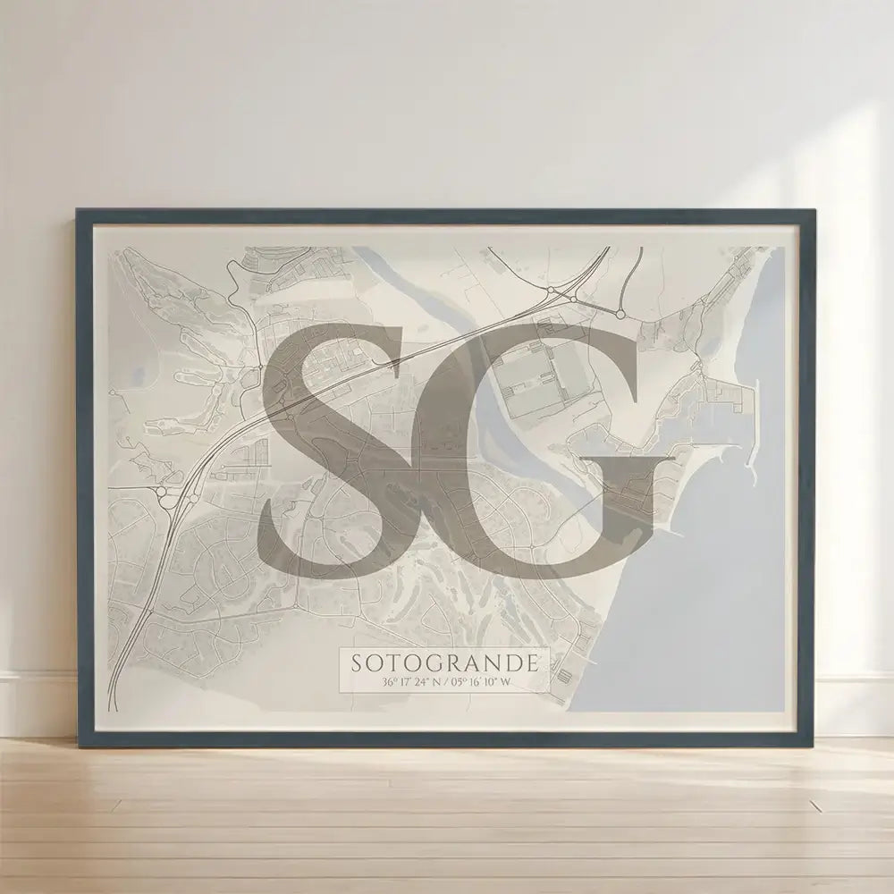 Framed Sotogrande in Classic design, inspired by chiseled typography with an elegant font that creates a beautiful visual contrast designed in light brown and an off-white background with no border edge-to-edge print leaning against a wall