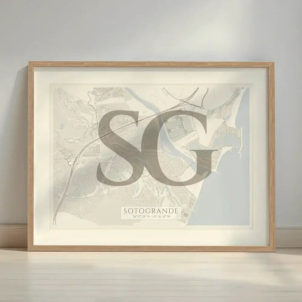Framed Sotogrande in Classic design, inspired by chiseled typography with an elegant font that creates a beautiful visual contrast designed in light brown and an off-white background with a white margin border in a warm lit minimalist setting
