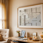 Modern interior design with a Tarragona in Inseparable design, featuring the city's abbreviation in expressive typography over a detailed urban map designed in light brown and an off-white background, displayed on a living room wall
