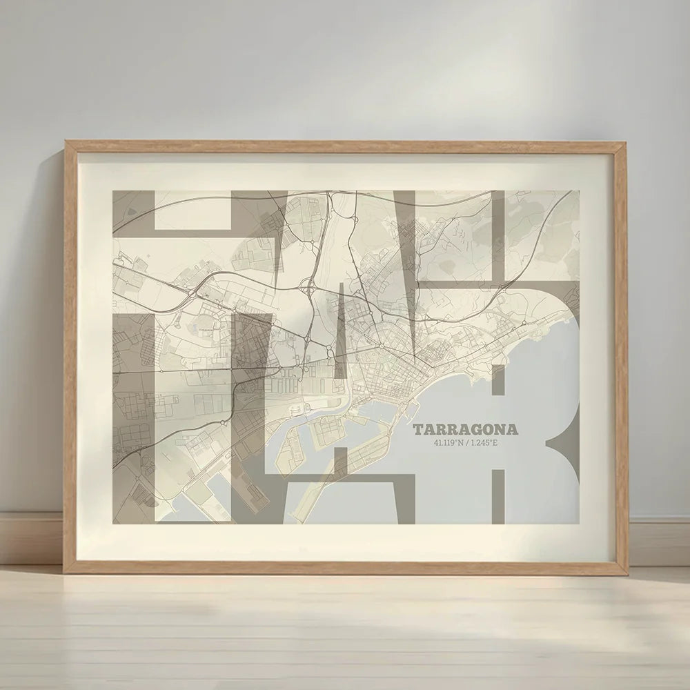 Framed Tarragona in Inseparable design, featuring the city's abbreviation in expressive typography over a detailed urban map designed in light brown and an off-white background with a white margin border in a warm lit minimalist setting