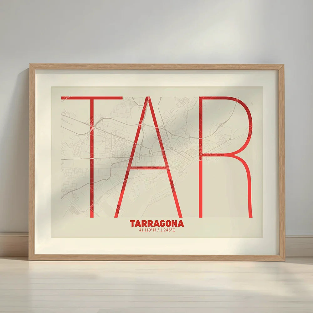 Framed Tarragona in Ultralight design, a minimalist aesthetic combining urban cartography with modern, extra-thin elegant lettering designed in red and an off-white background with a white margin border in a warm lit minimalist setting