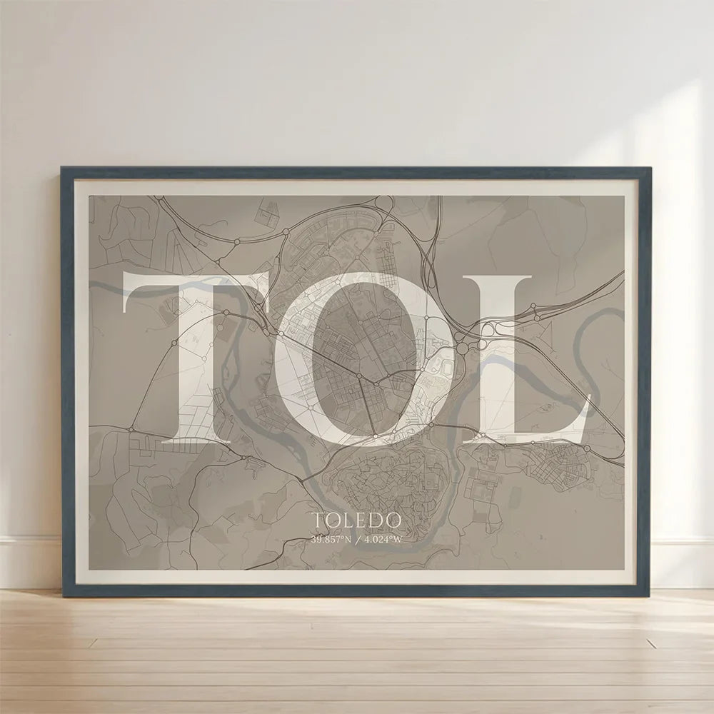 Framed Toledo in Classic design, inspired by chiseled typography with an elegant font that creates a beautiful visual contrast designed in light brown and an off-white background with no border edge-to-edge print leaning against a wall