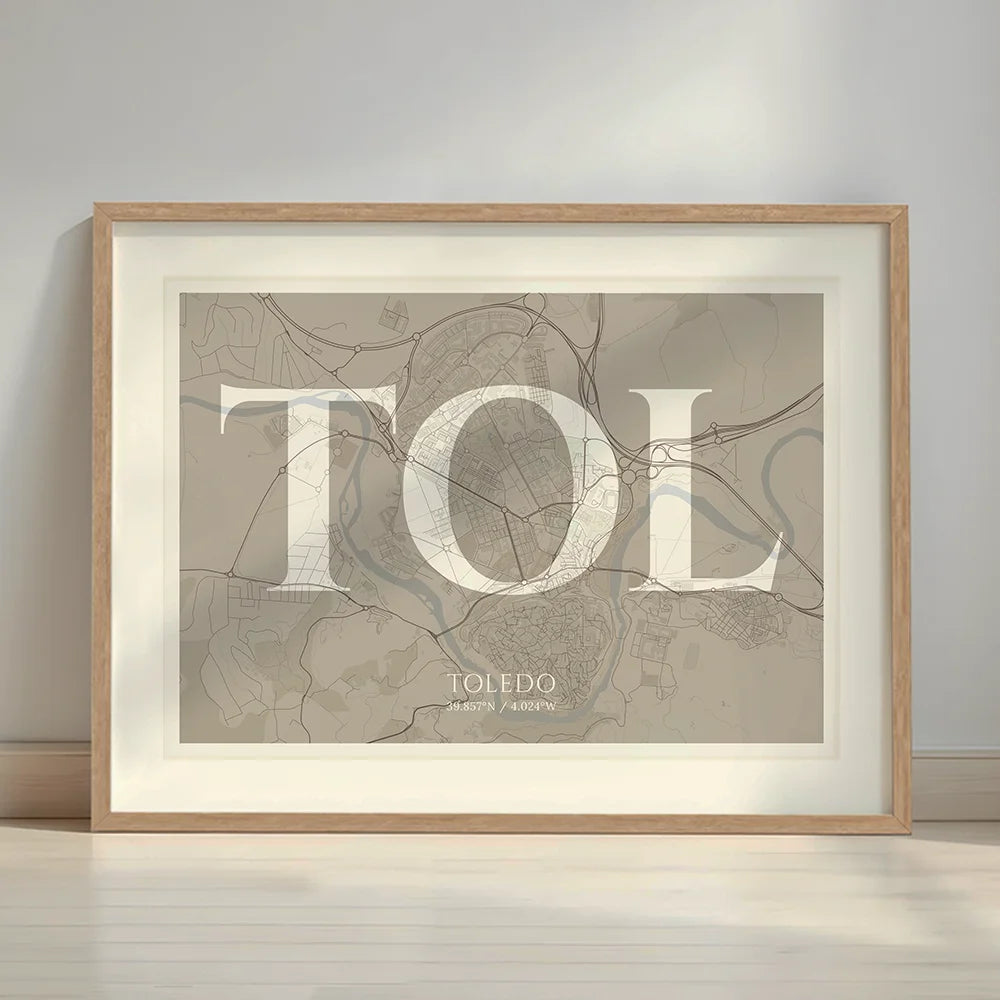 Framed Toledo in Classic design, inspired by chiseled typography with an elegant font that creates a beautiful visual contrast designed in light brown and an off-white background with a white margin border in a warm lit minimalist setting