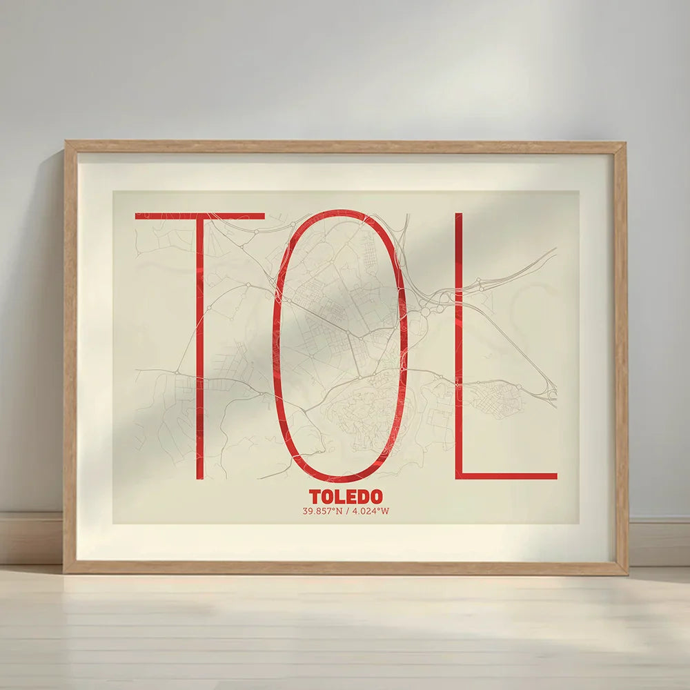 Framed Toledo in Ultralight design, a minimalist aesthetic combining urban cartography with modern, extra-thin elegant lettering designed in red and an off-white background with a white margin border in a warm lit minimalist setting