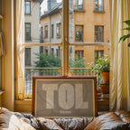 Modern interior design with a Toledo in Super Bold design, a typographic poster where the city map is overlaid with extra-thick lettering for a modern, high-impact look designed in light brown and an off-white background, displayed on a living room wall