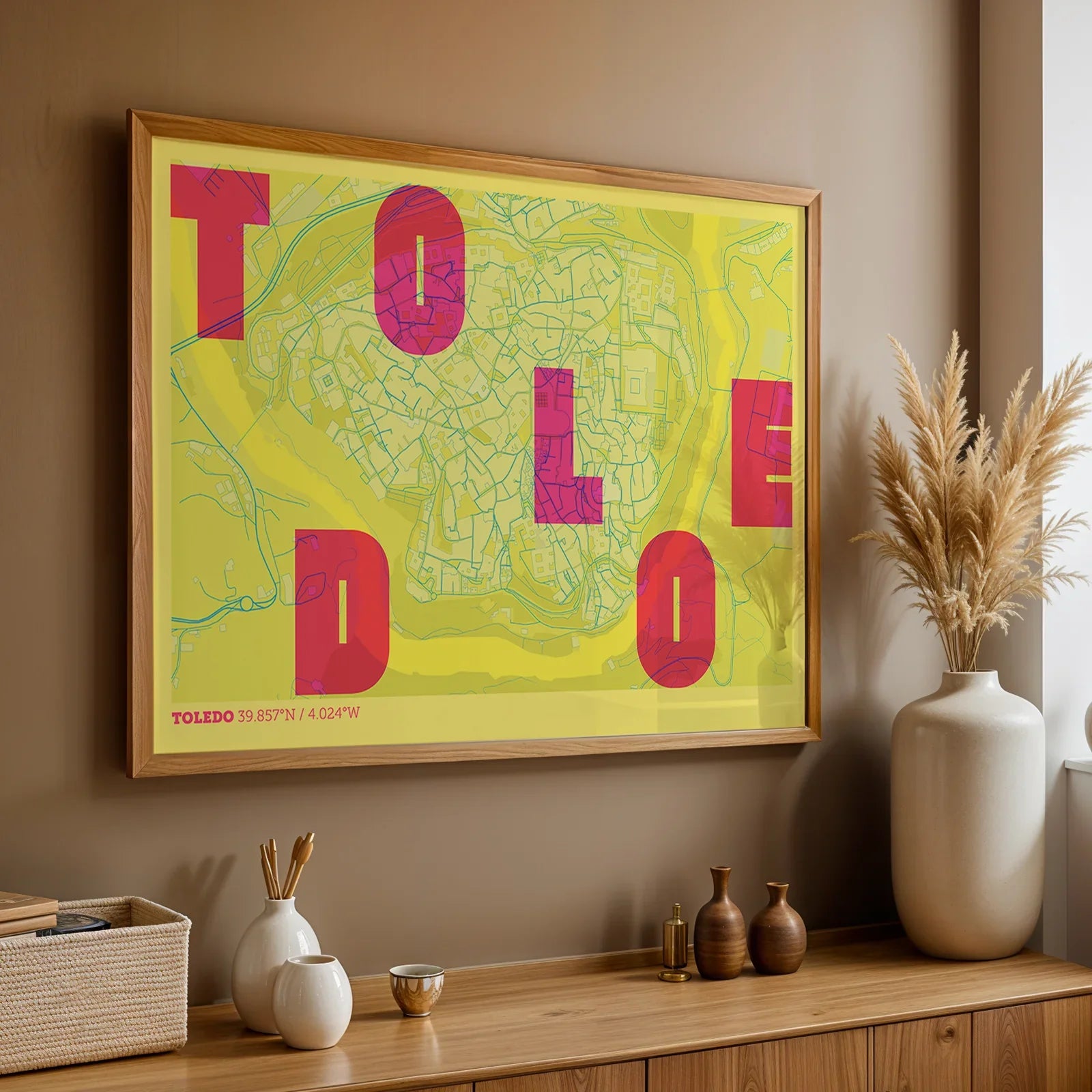 Modern interior design with a Toledo in Unruled design, where the city name letters appear randomly across different lines for a truly original urban layout designed in yellow and fuchsia, displayed on a living room wall