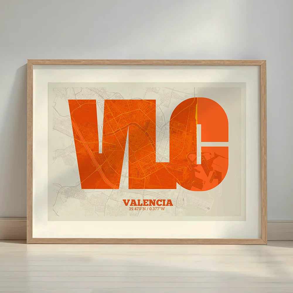 Framed Valencia in Super Bold design, a typographic poster where the city map is overlaid with extra-thick lettering for a modern, high-impact look designed in orange and an off-white background with a white margin border in a warm lit minimalist setting