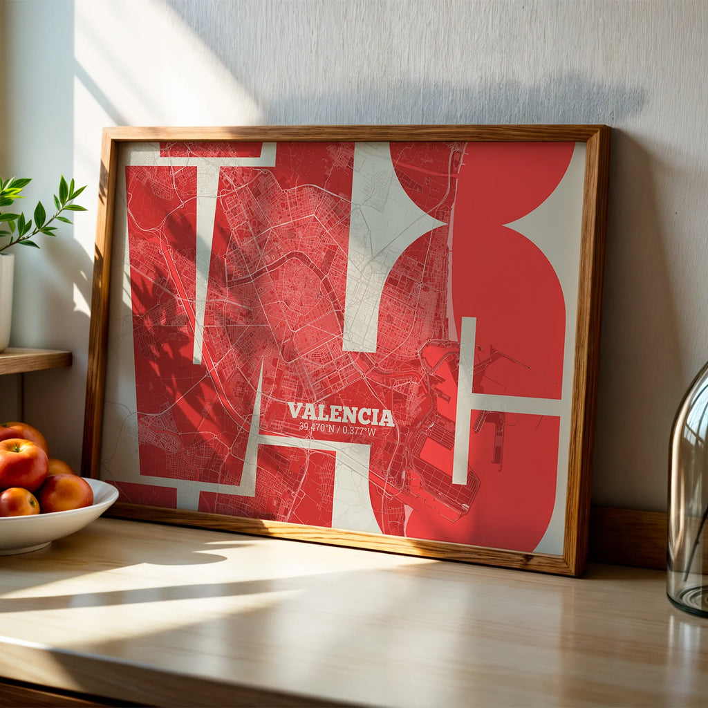 Modern interior design with a Valencia in Inseparable design, featuring the city's abbreviation in expressive typography over a detailed urban map designed in red and an off-white background, displayed on a living room wall