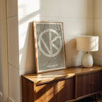 Modern interior design with a Vallecas in Super Bold design, a typographic poster where the city map is overlaid with extra-thick lettering for a modern, high-impact look designed in light brown and an off-white background, displayed on a living room wall