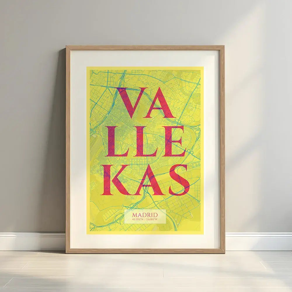 Framed Vallecas in Classic design, inspired by chiseled typography with an elegant font that creates a beautiful visual contrast designed in yellow and fuchsia with a white margin border in a warm lit minimalist setting