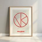 Framed Vallecas in Ultralight design, a minimalist aesthetic combining urban cartography with modern, extra-thin elegant lettering designed in red and an off-white background with a white margin border in a warm lit minimalist setting