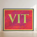 Framed Vitoria-Gasteiz in Classic design, inspired by chiseled typography with an elegant font that creates a beautiful visual contrast designed in yellow and fuchsia with no border edge-to-edge print leaning against a wall