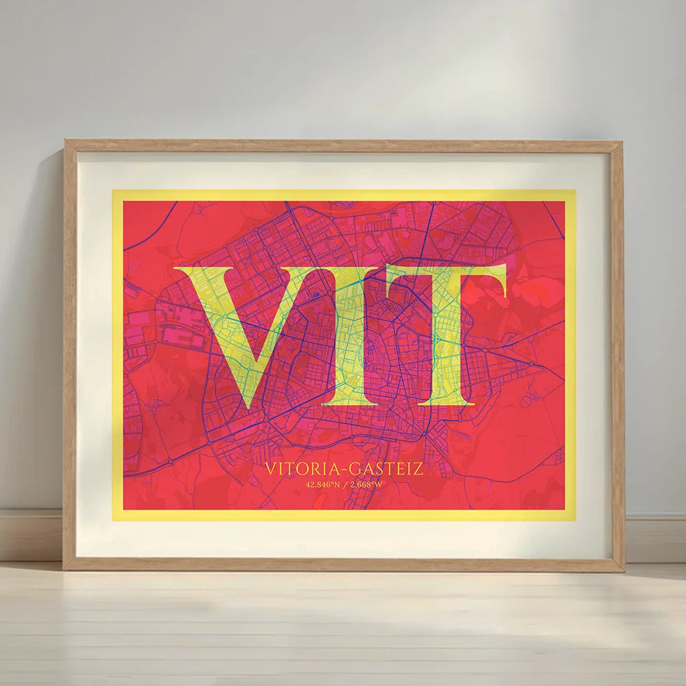 Framed Vitoria-Gasteiz in Classic design, inspired by chiseled typography with an elegant font that creates a beautiful visual contrast designed in yellow and fuchsia with a white margin border in a warm lit minimalist setting