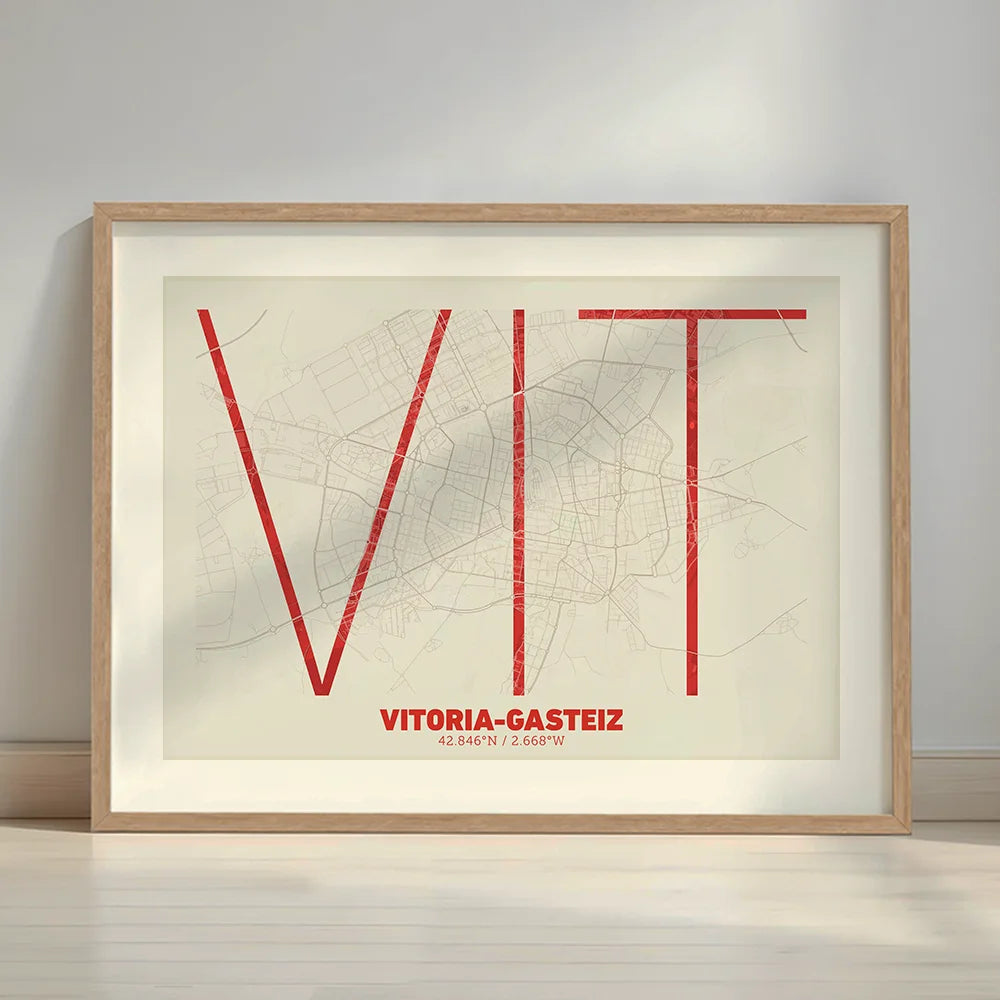 Framed Vitoria-Gasteiz in Ultralight design, a minimalist aesthetic combining urban cartography with modern, extra-thin elegant lettering designed in red and an off-white background with a white margin border in a warm lit minimalist setting