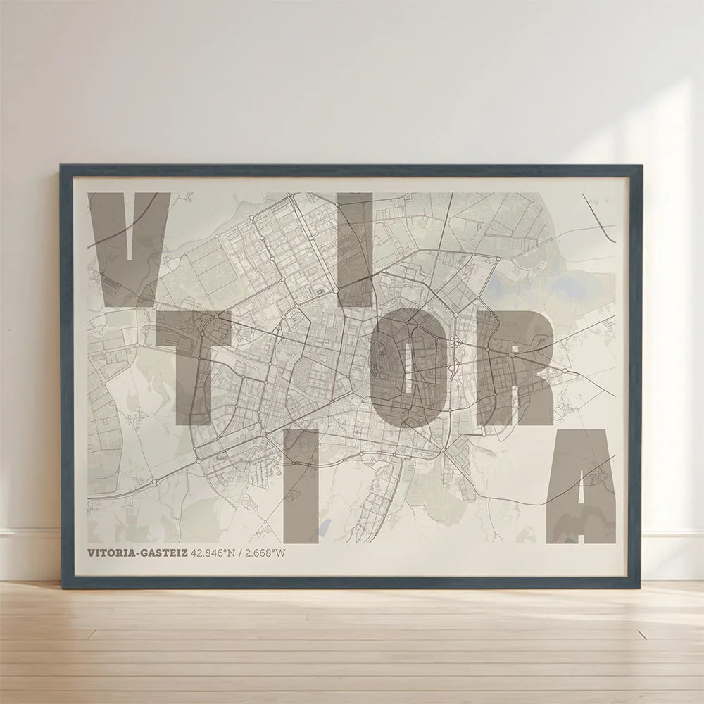 Framed Vitoria-Gasteiz in Unruled design, where the city name letters appear randomly across different lines for a truly original urban layout designed in light brown and an off-white background with no border edge-to-edge print leaning against a wall