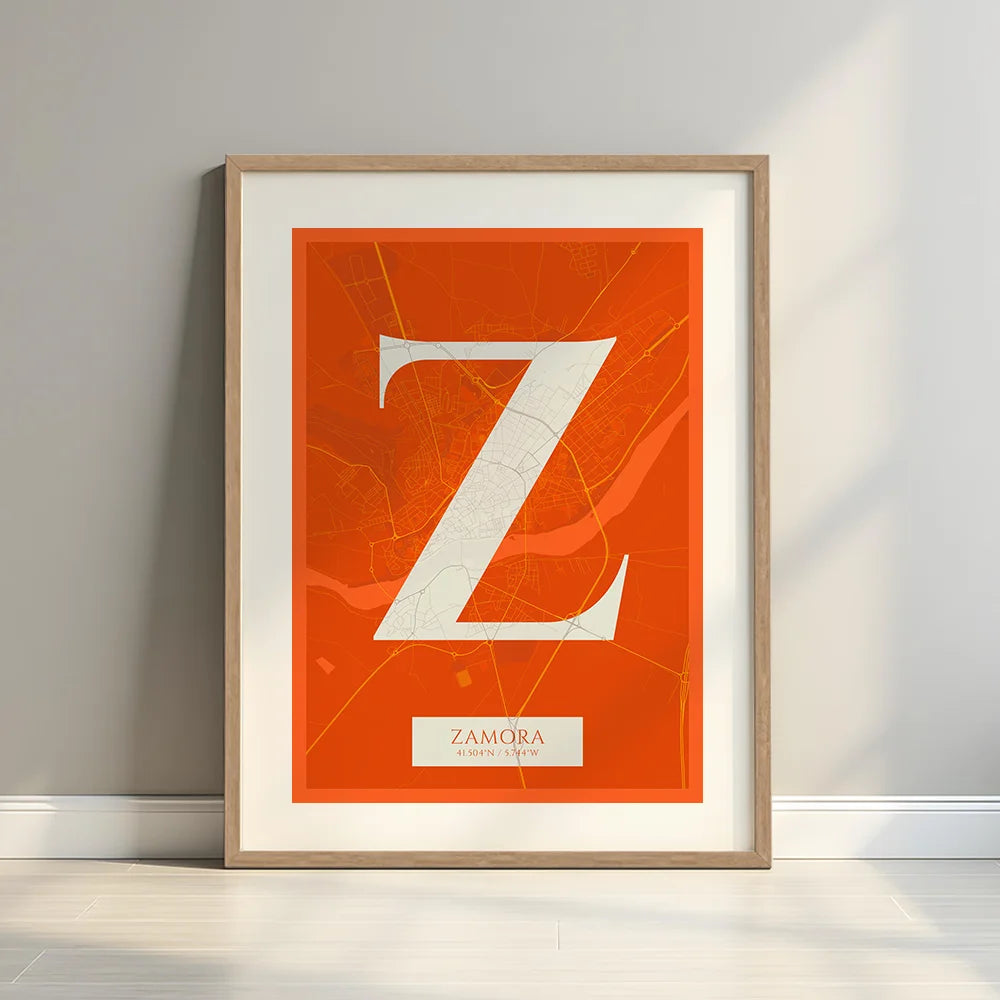 Framed Zamora in Classic design, inspired by chiseled typography with an elegant font that creates a beautiful visual contrast designed in orange and an off-white background with a white margin border in a warm lit minimalist setting