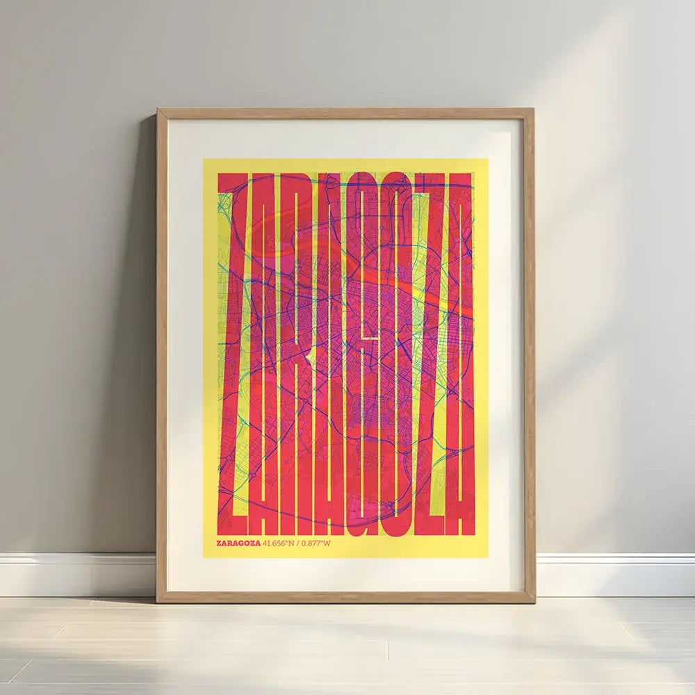 Framed Zaragoza in Extra Compressed design, where the letters are tightly squeezed to fit the city's map shape designed in yellow and fuchsia with a white margin border in a warm lit minimalist setting